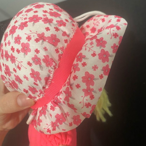 Soft doll used with sewn hat seams
