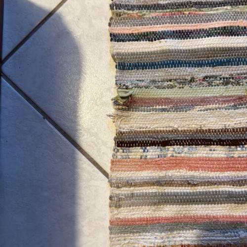 Rug used 2.80x0.78 m with hole and wear on the side