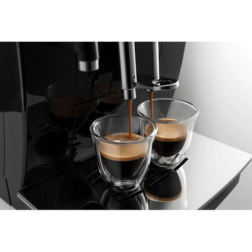 Espresso coffee maker like new with coffee beans and milk frother