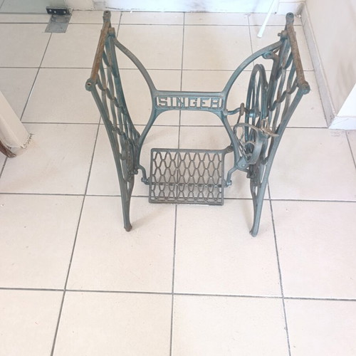 Vintage table console with Singer cast iron base and marble top used