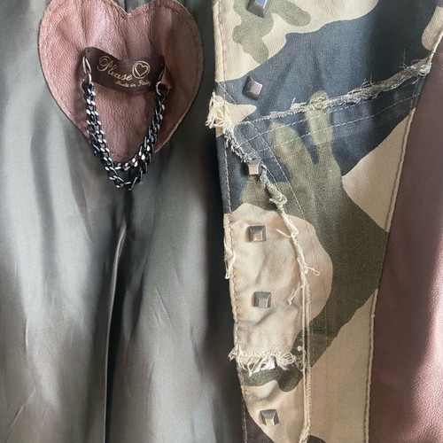 Short jacket used, tan leatherette with camouflage patches