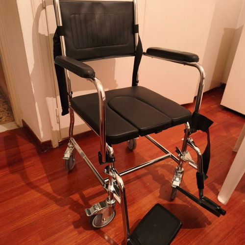 Chair for elderly used with wheels and belt
