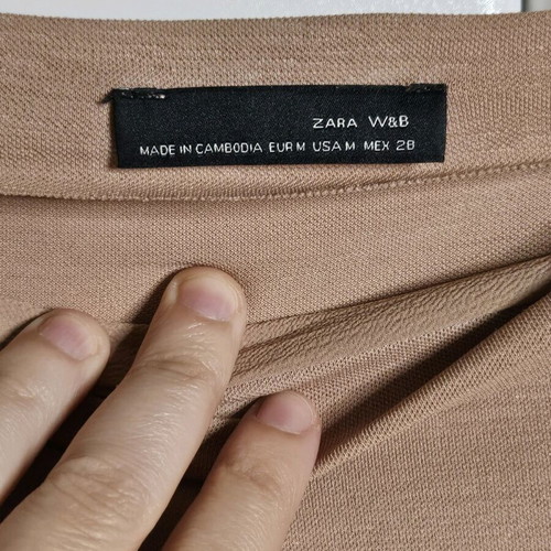 Asymmetric Zara blouse in powder pink like new size M