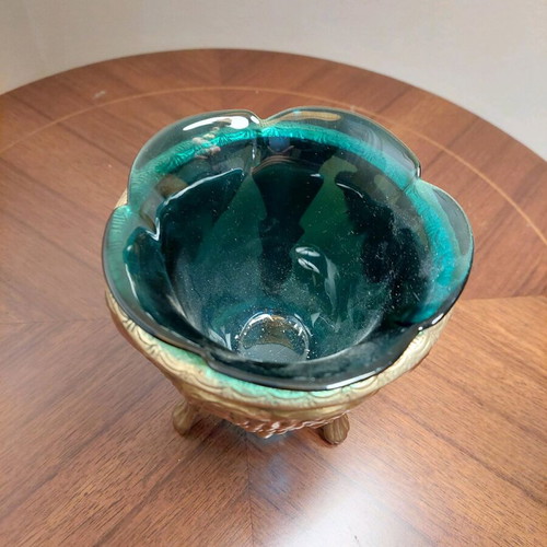 Vintage glass petrol planter with metal base like new