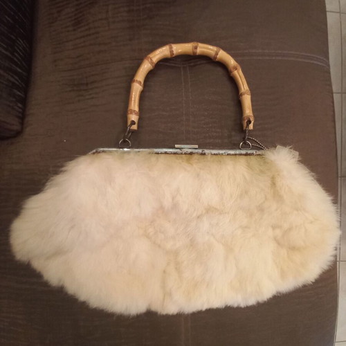 Pierro faux leather bag and Lollipops real fur bag used