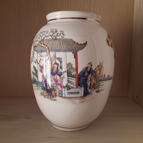 Collectible decorative porcelain vase with lid used