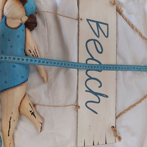 Wooden wall decoration swimmer like new