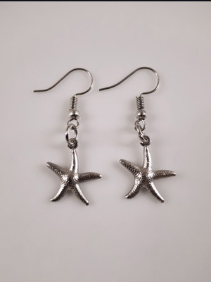 Steel earrings with dangling starfish in silver tone new
