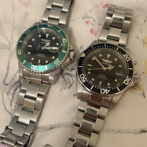 Invicta wristwatches, 2 pieces, green quartz and black automatic