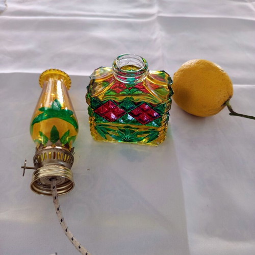 Vintage glass oil lamp with colorful embossed glass like new
