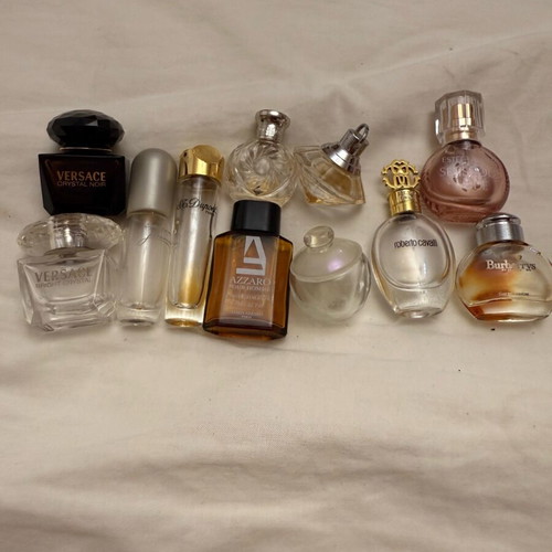 Collection of 11 authentic miniature perfumes like new