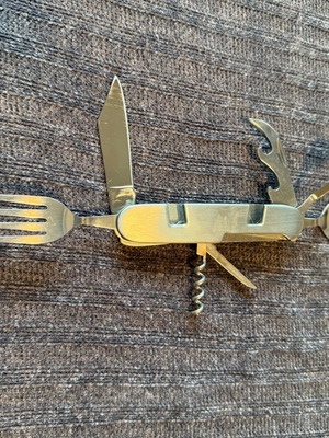 6-Function Pocket Knife like new with knife, fork, spoon, and opener