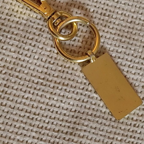Authentic Prada gold key ring unisex like new