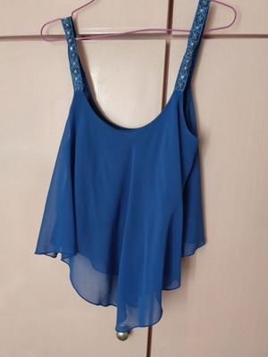 Asymmetric blue women's blouse with muslin and decorative sequins, like new