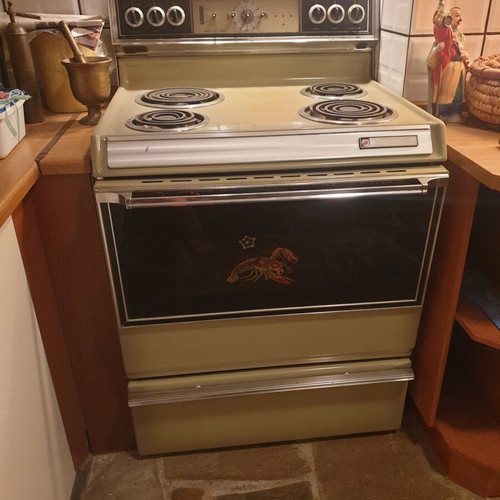 Vintage 1970s home appliance set used, General Electric fridge, Kenmore stove, Ariston washer