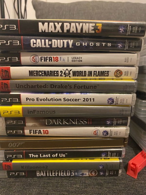 PlayStation 3 Slim used with 24 games and compatible controller bundle