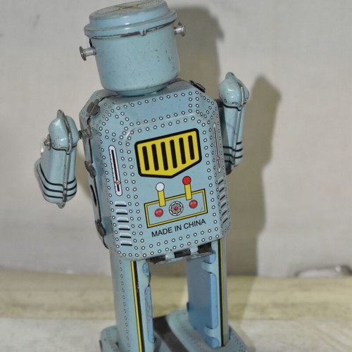 Vintage tin wind-up robot used, blue color