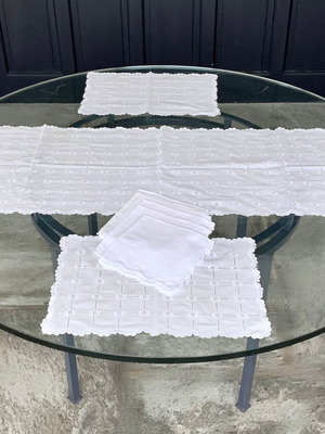 White table linens set used, cotton with lace, includes runners and napkins