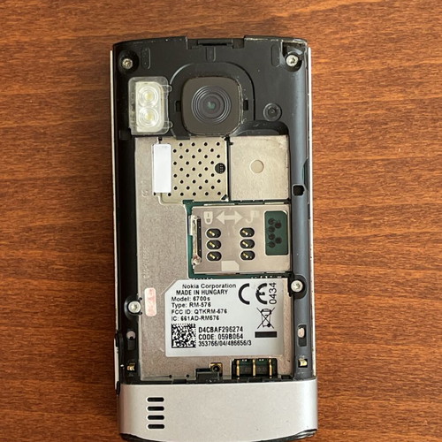 Nokia 6700s phone used with metal body and original battery