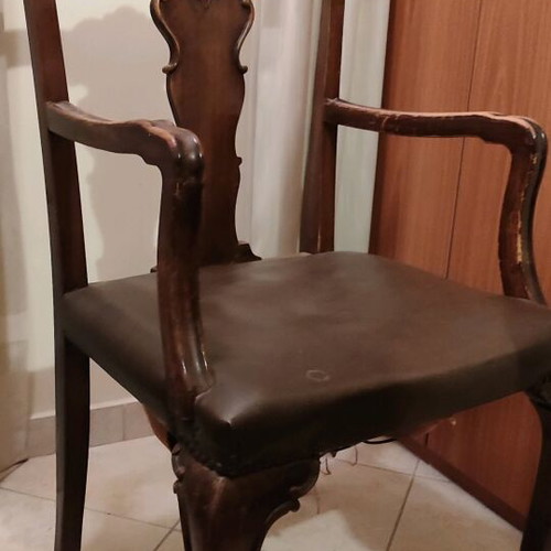 Antique armchair used, wooden with leather seat