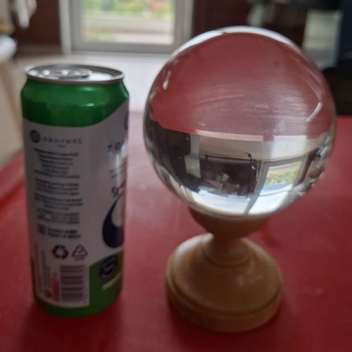 Crystal sphere with wooden base like new, 11cm diameter