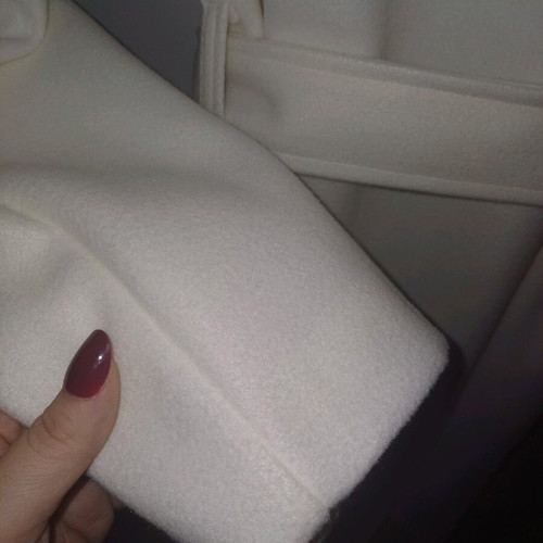Cream coat new, one size, length 117 cm