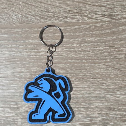 Peugeot keychain with retro lion logo, 3D printed and hand-painted