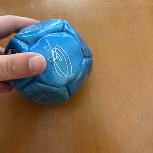 Decorative Barcelona ball with Messi, Xavi, Iniesta signatures
