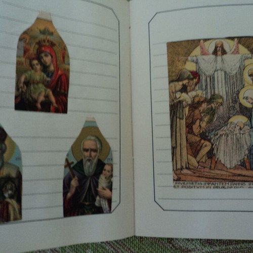 Album with over 50 used religious chromolithograph cards