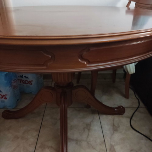 Walnut dining table with chairs used, round extendable, classic design