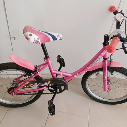 Girl's City Bicycle pink with designs like new, includes training wheels