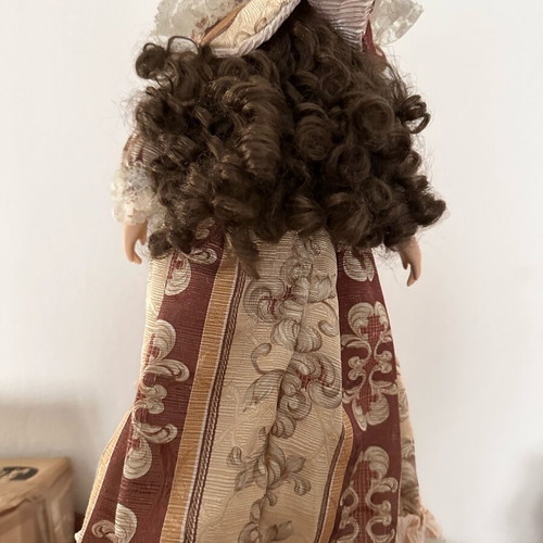Porcelain doll new, old antique, height 45 centimeters