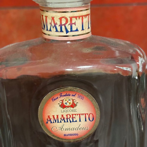 Amaretto glass liquor bottle like new