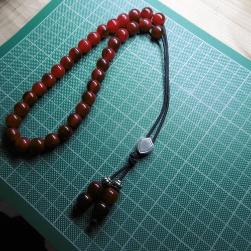 Handmade komboloi with 33+4 acrylic beads and silver shield