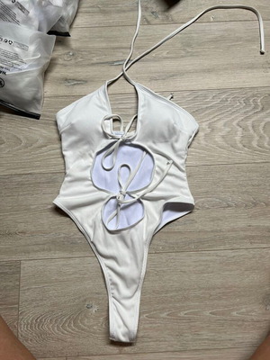Women's modern one-piece swimsuit with crossed straps, like new, white, XL