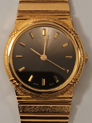 Quartz wristwatch with double bracelet and brown dial new