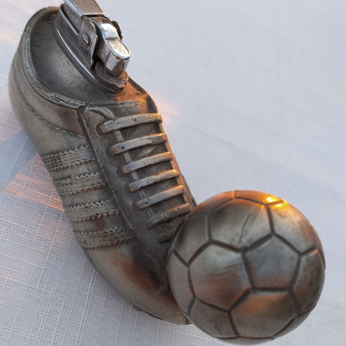 Sports collectible lighter shaped like a shoe with ball, like new