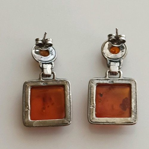 Silver 925 earrings used with natural orange amber