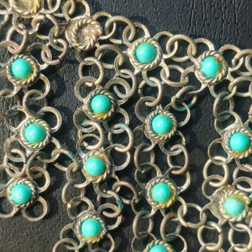 Vintage necklace used with turquoise stones and plated metal
