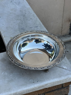 Vintage silver-plated fruit bowl with three legs, used