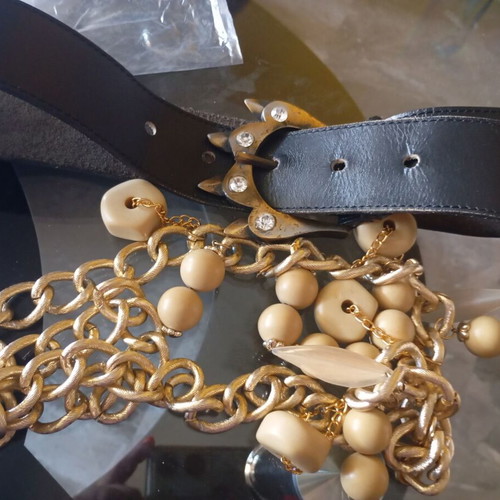 Belts used, black and gold, size 75