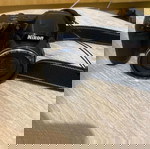  Nikon φωτογραφική μηχανή δίνεται μαζί και φορτιστής με 4 μπαταρίες επαναφόρτισης  και θήκη μεταφοράς