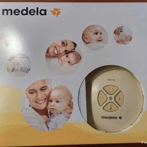 Medela Swing Flex breast pump with storage bags like new