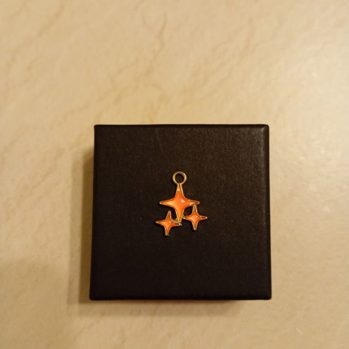 Pendant with star design, gold plated, new
