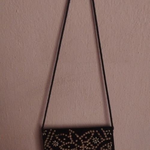 Black crossbody bag decorated with silver embroidery and beads