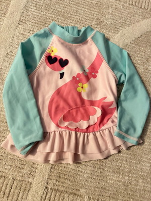 Swimsuit top used with UVA and UVB protection for baby girl up to 18 months