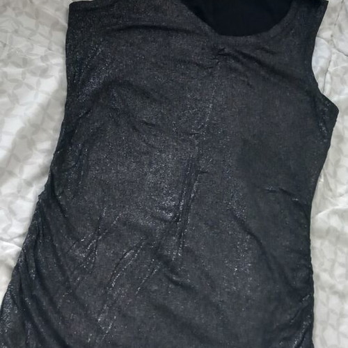 Sleeveless top, shiny elastic fabric. Size M/L