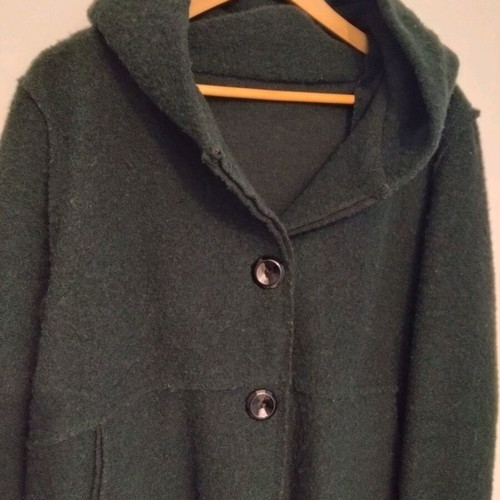 Wool coat in cypress color with oversized hood, used