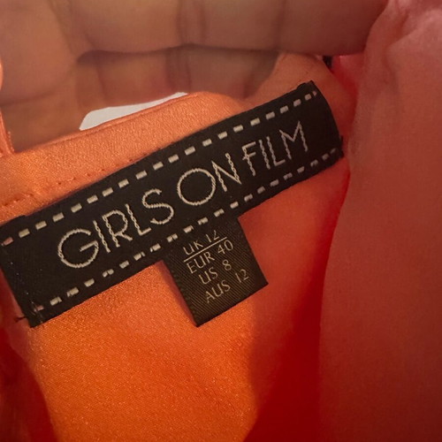Peach dress like new size L with bow detail on back