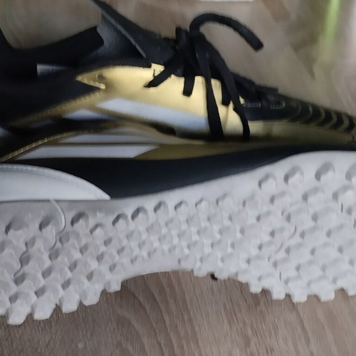 Adidas Messi football shoes, black and gold